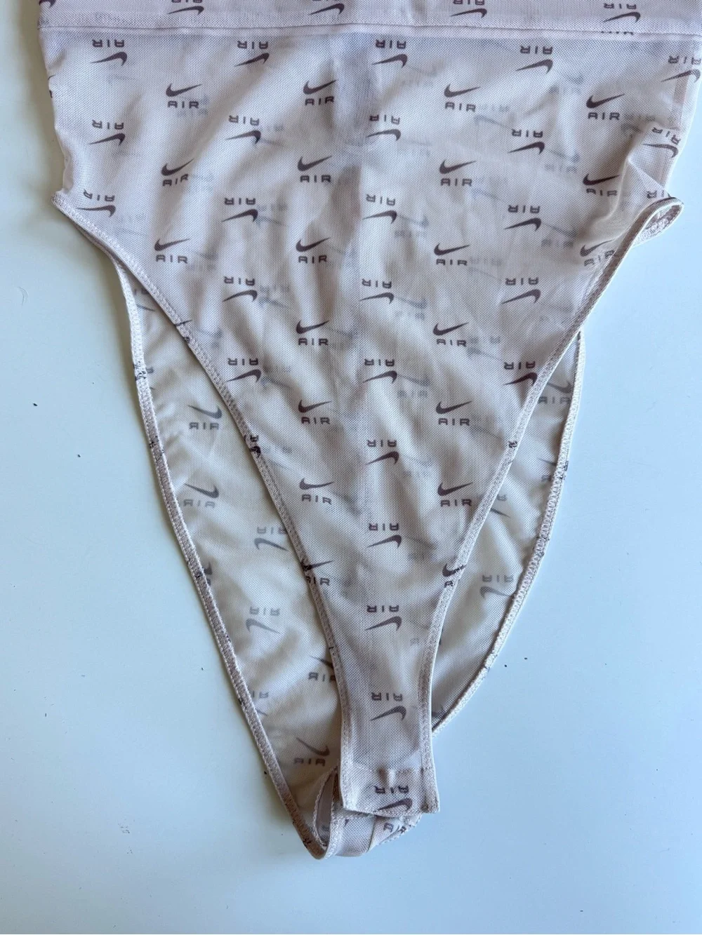 NIKE AIR PRINTED MOCK-NECK BODYSUIT WOMENS SIZE S